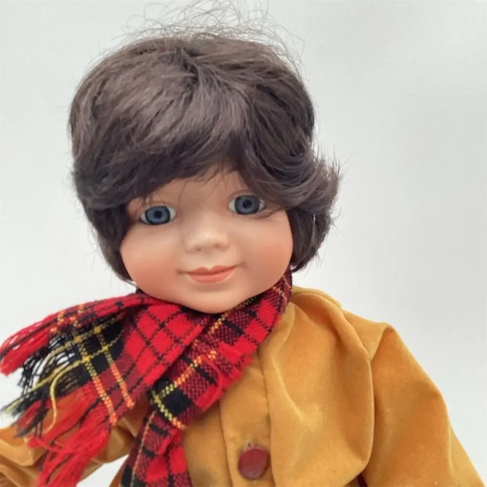A Vintage Porcelain Boy Doll 16”with Ice Skates‎ Winter Theme